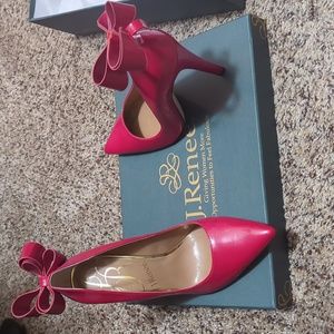 Red stilettos with red bow as is
